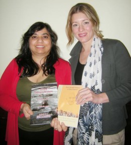 Dr. Monika Spolia presenting her books to Melanie Joly