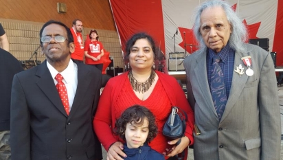 Pastor Peter Rajan, Dr. Monika Spolia and her son SarvNathan with Stephen Gill honored at Canada's 150th Anniversary