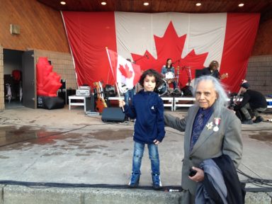 Nathan celebrating with Stephen Gill honored at Canada's 150th Anniversary